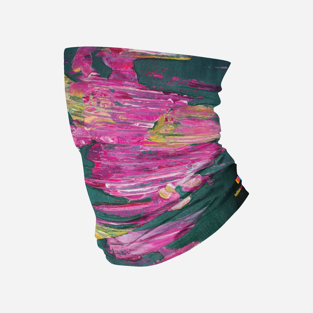 Un tube de cou multifonctionnel avec un imprimé floral abstrait rose et vert vibrant, posé à plat sur fond blanc.