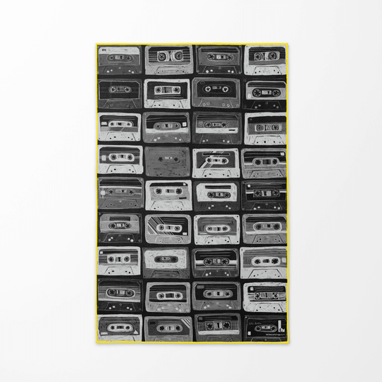 Gros plan du motif noir et blanc de cassette sur la serviette de plage Mixtapes.