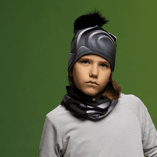 Close-up of a child wearing the Rockies Beanie and neck gaiter, showcasing the design.