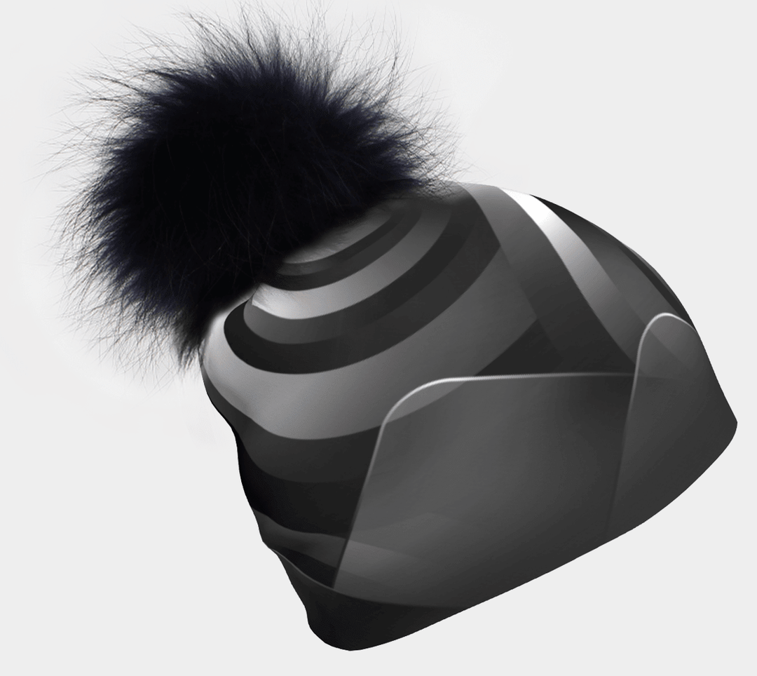 Rockies Beanie with a fluffy black pompom against a white background.