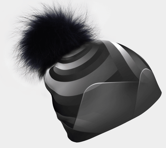 Rockies Beanie with a fluffy black pompom against a white background.