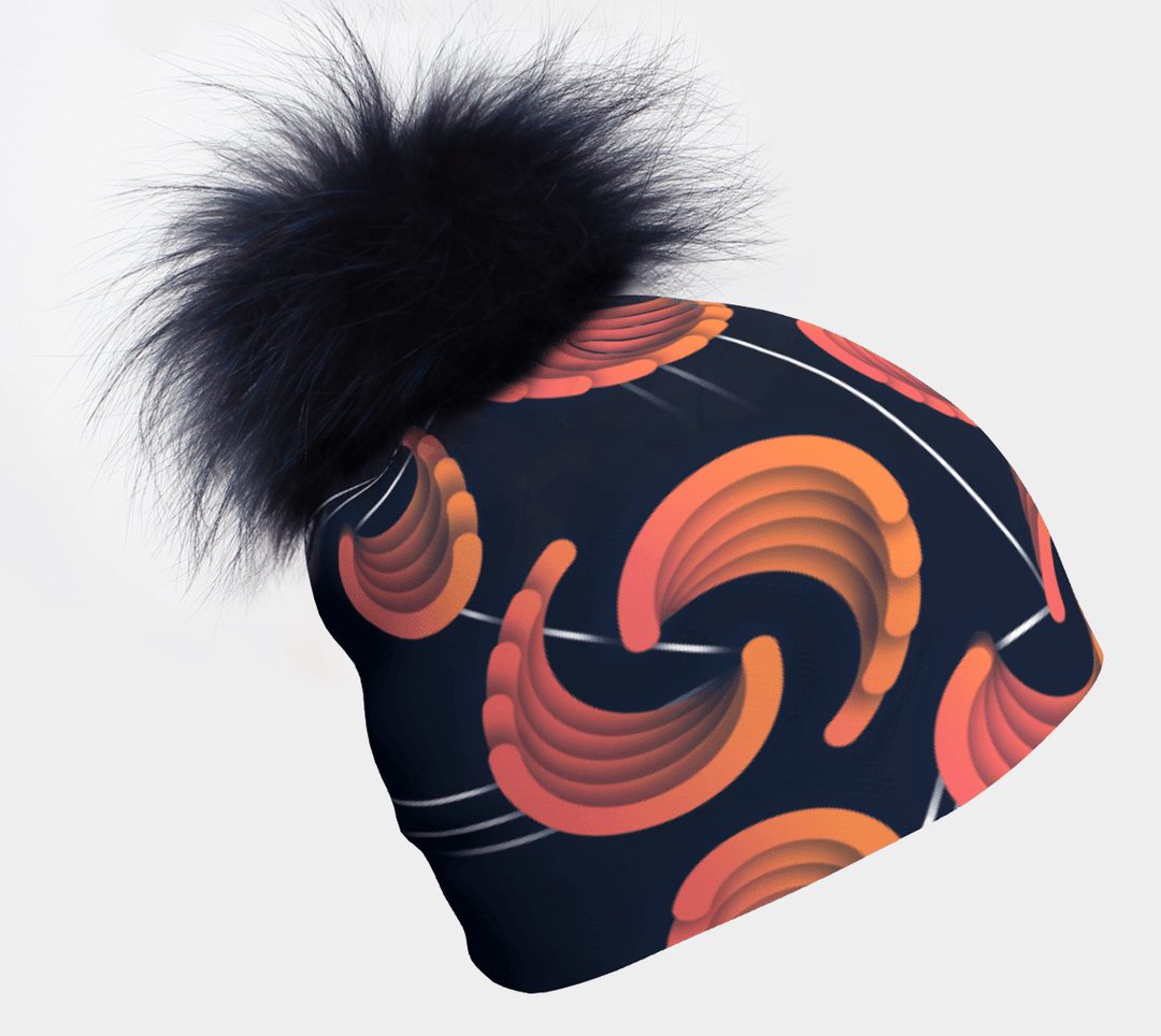 Tuque pour femme avec pompon marine et motif abstrait marine et orange sur fond blanc