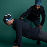 Sporty man doing sports exercises and wearing the black and grey hat designed by the artist Valery Goulet. This unisex beanie can be worn in any season and is suitable for the whole family. Our Lalita's Art Shop toques are designed to go everywhere with you!
