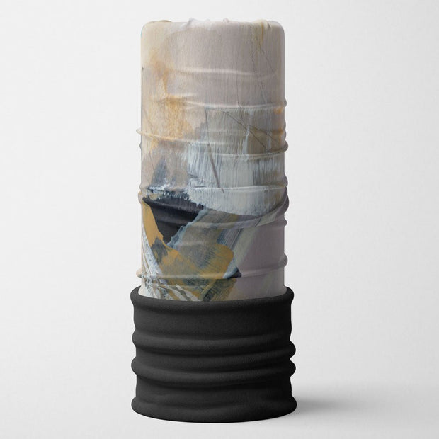 A Black, beige and white tubular Neck warmer made from recycled plastic bottles of water with a 20 cm black fleece bottom.