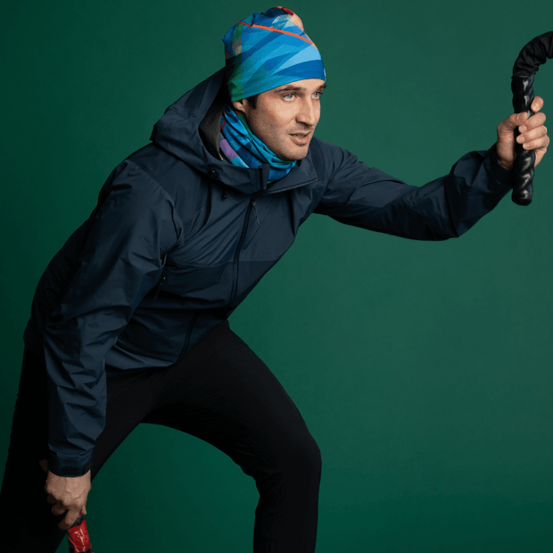 This blue bamboo hat is the  best hat for running, training and under your helmet for skiing and snowboarding. Unisex, perfect men and women’s hat. Like this young man, pair our Fast Triangle 4 season  beanie with our face gaiter tube made with Repreve receycled fibers! 