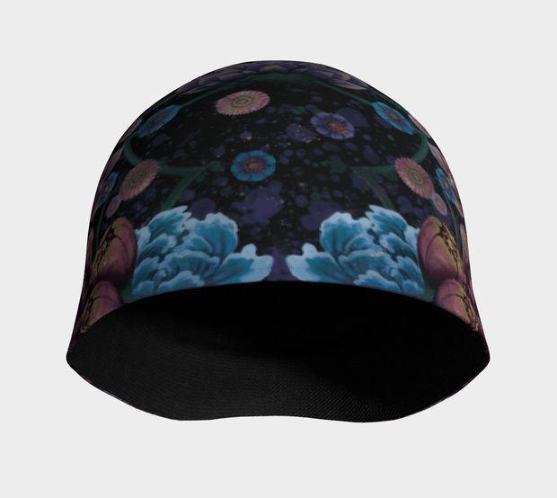 Front photo of the Flora beanie designed by artist Claire Anghinolphi. This bamboo beanie is perfect for all sports activities. It is black with pretty floral patterns and goes with all your outfits