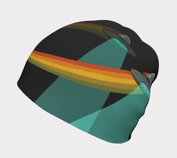 Right view of the Flying Saucer beanie hat illustrated by Artiste André Martel. you see a composition of 2 flying saucers with a orange, yellow and green rainbow on a black background.. 