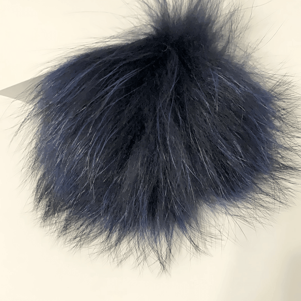 Pompon en fourrure avec bouton plat