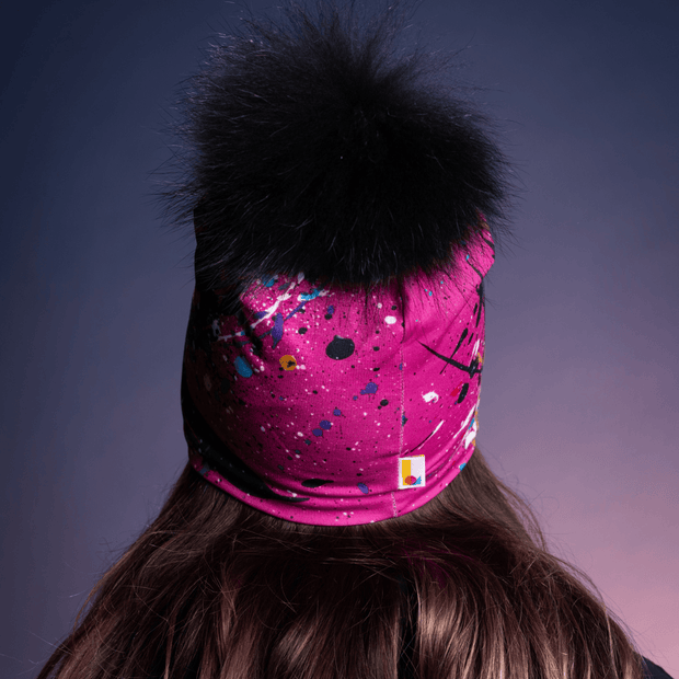 Back view of the Pink Nest Pom Beanie by Lalita's Art Shop and designed by artist Megane Fortin