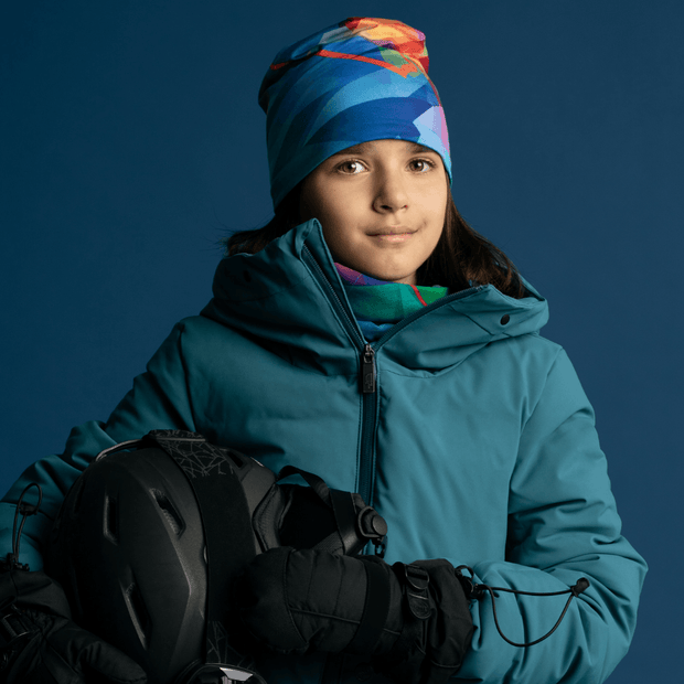 Best ski beanie and neck warmer. This girl is wearint the electric and colourful beanie and tubular scarf duo designed by Ankhone