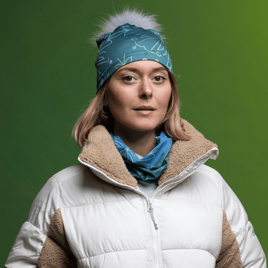 Sportive woman wearing the Turquoise Wallpaper fleece tube by Valery Goulet for Lalita&