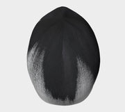 Top view of Lalita's Art Shop Abstract Brush Stroke Grow-with-me beanie is the perfect hat to wear season after season and under your helmet. This black and white tuque is breathable with its bamboo lining and super comfortable
