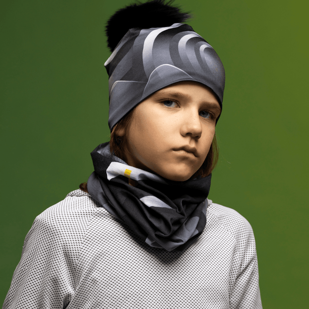 Boy wearing the Black and Gray Rockies Multifunctional Bandana by Zaire for the Lalita's Art Shop 24 collection