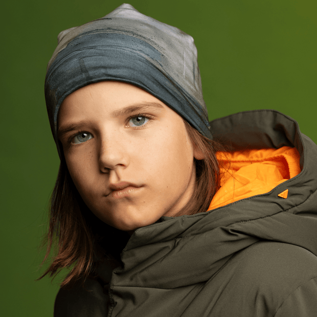 Teenager wearing the Green and Gray Wall Beanie by Elise Charette for Lalita's Art Shop