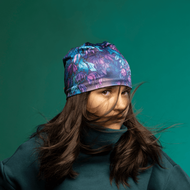 Teenage girl wearing the Purple and Blue Wisteria Sport Beanie by Claire Anghinolfi for the Lalita's Art Shop 24 Collection