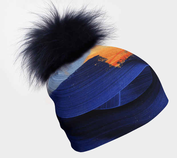 Photo of the Yellow and Blue hat with detachable pompom illustrated by the street artist Ankhone. Ultra stretchy and breathable bamboo hat, it fits all the family. Ideal gift for sportsmen